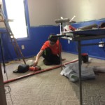 CJ helps with painting and other work CJ helps with painting by painting the trim red