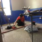 CJ helps with painting and other work CJ helps with painting by painting the trim red