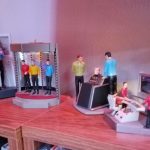 Ornaments depicting Mirror, Mirror, the TOS transporter, The Menagerie, and Wrath of Khan sit on a shelf. Each has its own sound effects from the depicted scene. The ornaments are free standing and use watch batteries